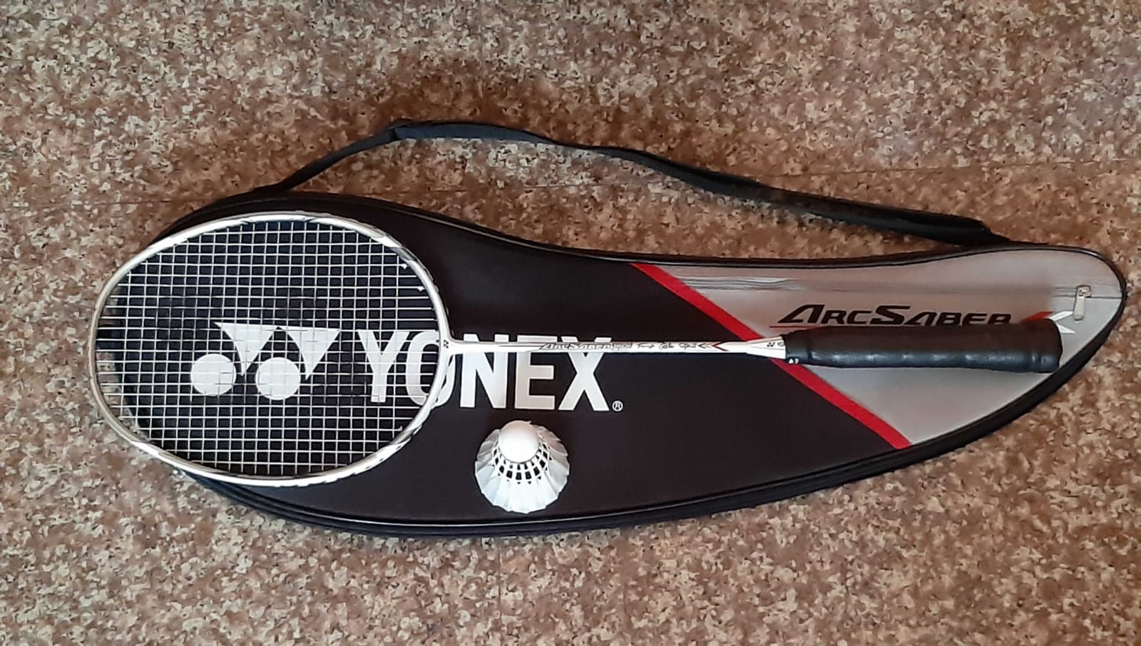 Yonex badminton racket with a shuttlecock