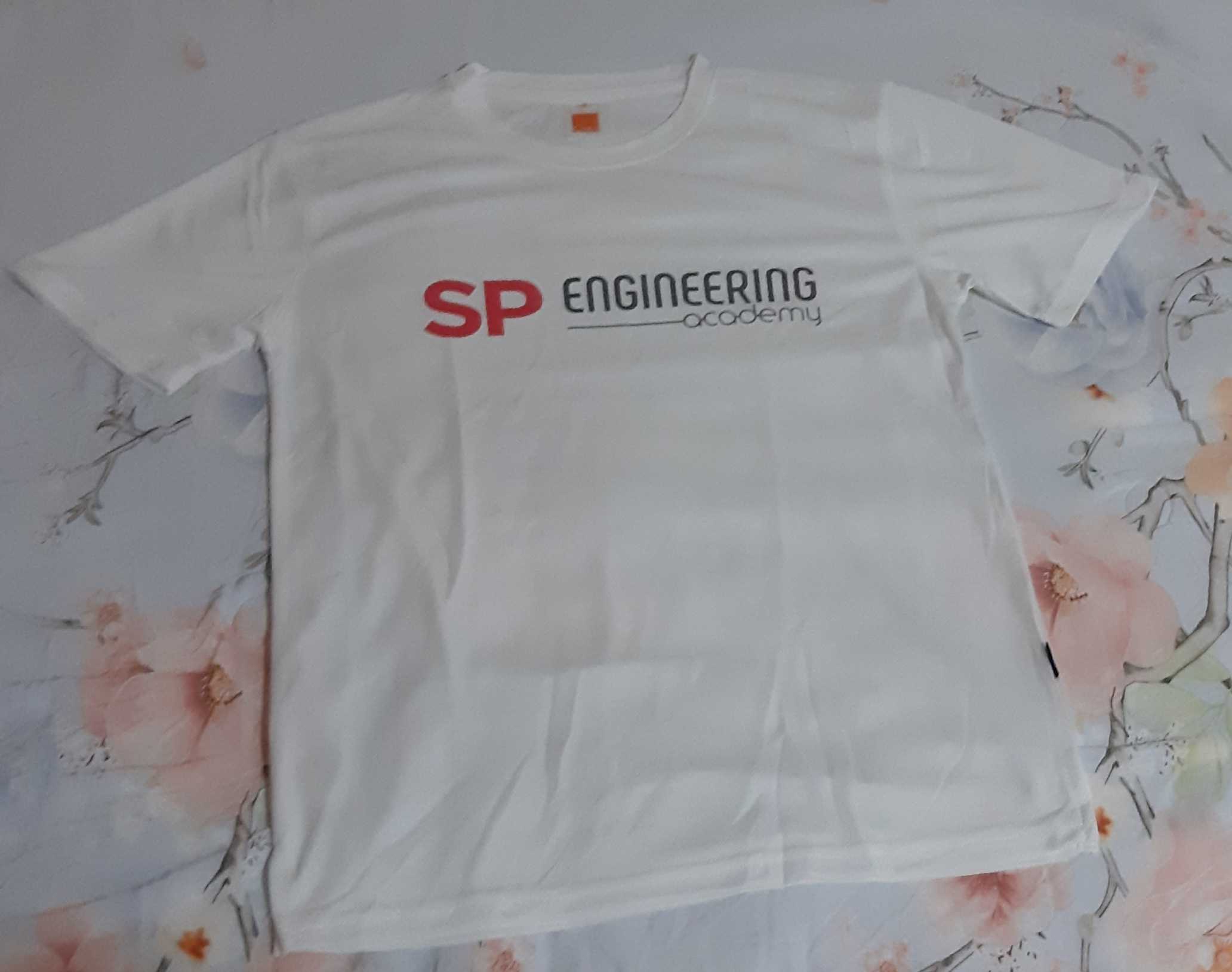 Front side of a T-shirt with the SP Engineering Academy logo